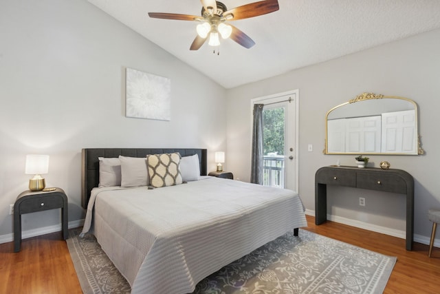 133 Pomar St, Saint Augustine, FL 32084 - bedroom featuring access to outside, lofted ceiling, wood finished floors, and ceiling fan
