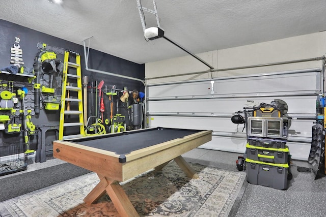 190 River Mist Dr, Saint Augustine, FL 32095 - playroom featuring pool table, a garage, and a textured ceiling