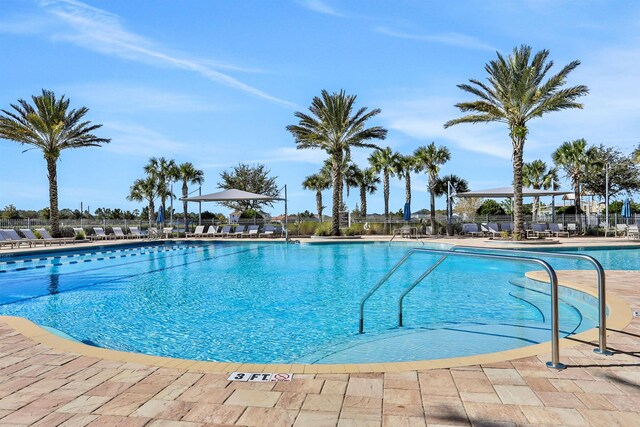 190 River Mist Dr, Saint Augustine, FL 32095 - community pool with fence and a patio