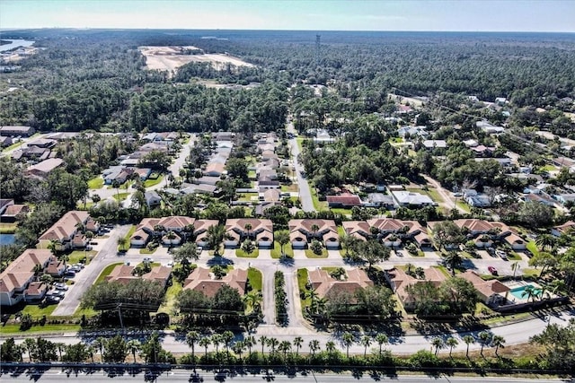 2001 Palm Dr Unit 101, Flagler Beach, FL 32136 - birds eye view of property with a residential view and a wooded view