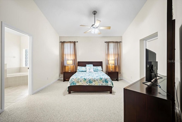 2001 Palm Dr Unit 101, Flagler Beach, FL 32136 - bedroom featuring baseboards, ceiling fan, carpet flooring, and ensuite bath