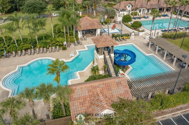 view of pool featuring a gazebo and a water slide