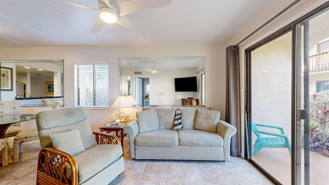 880 A1A Beach Blvd Unit 6101, Saint Augustine, FL 32080 - living area featuring a ceiling fan, healthy amount of natural light, and light tile patterned floors