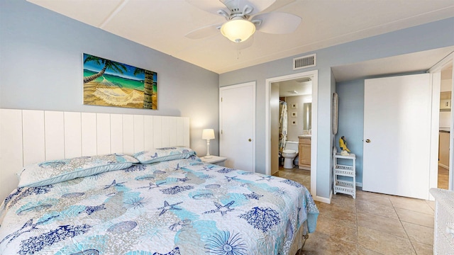 880 A1A Beach Blvd Unit 6101, Saint Augustine, FL 32080 - bedroom featuring ensuite bath, ceiling fan, and tile patterned flooring