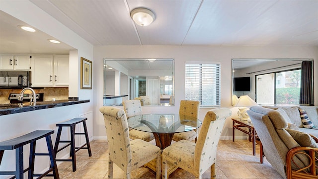 880 A1A Beach Blvd Unit 6101, Saint Augustine, FL 32080 - dining room featuring baseboards, recessed lighting, and light tile patterned flooring