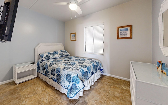 880 A1A Beach Blvd Unit 6101, Saint Augustine, FL 32080 - bedroom with baseboards, light tile patterned floors, and ceiling fan