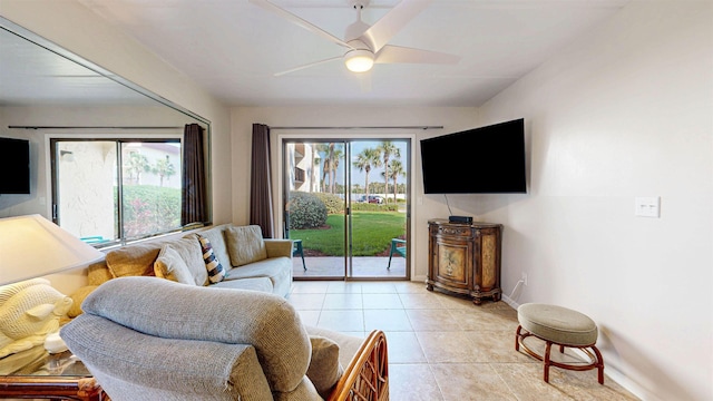 880 A1A Beach Blvd Unit 6101, Saint Augustine, FL 32080 - living area with a ceiling fan, light tile patterned flooring, and baseboards