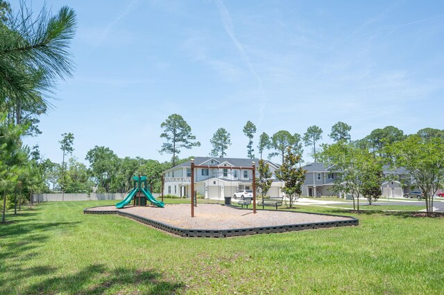 view of playground with a yard