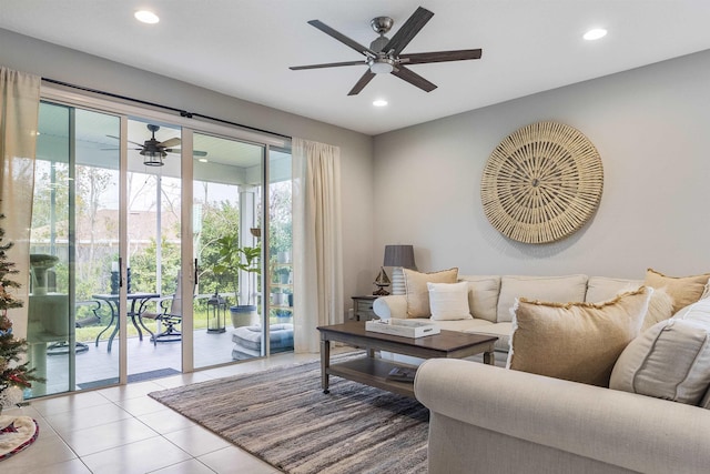 tiled living room featuring ceiling fan