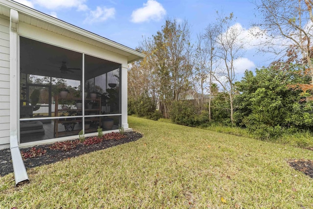 view of yard featuring a sunroom