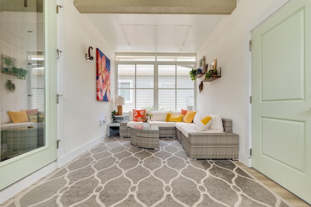 interior space featuring beam ceiling