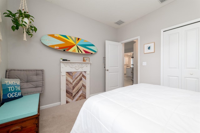 bedroom featuring a closet and carpet floors