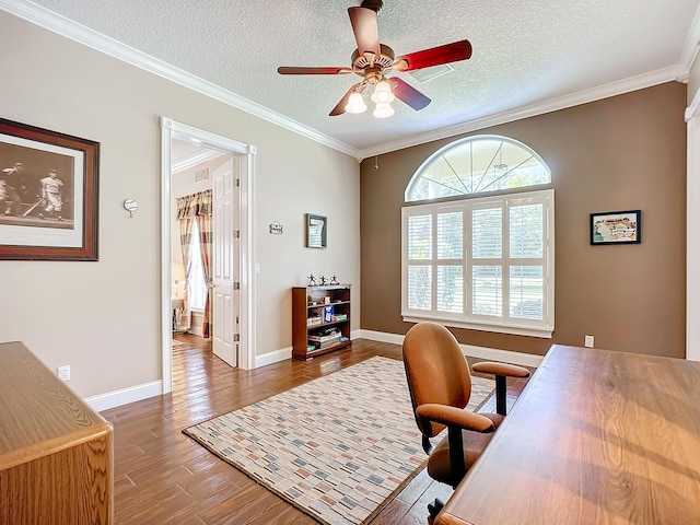 office space with ceiling fan, wood-type flooring, a textured ceiling, and ornamental molding