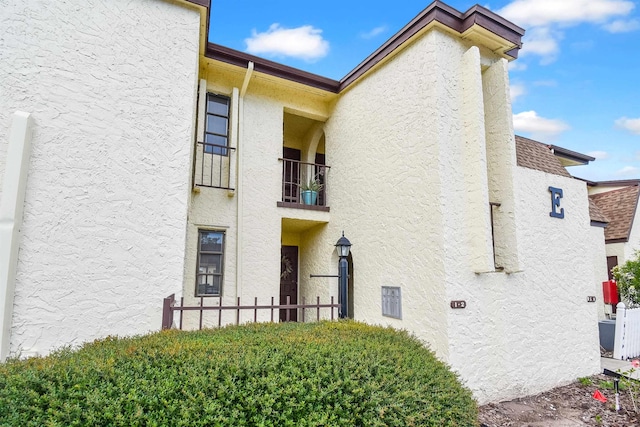 exterior space featuring central AC unit