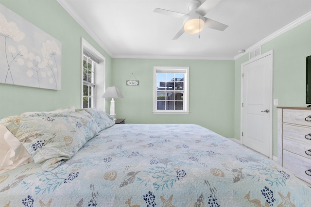 12 13th St, Saint Augustine Beach, FL 32080 - tiled bedroom featuring ceiling fan, baseboards, ornamental molding, and visible vents