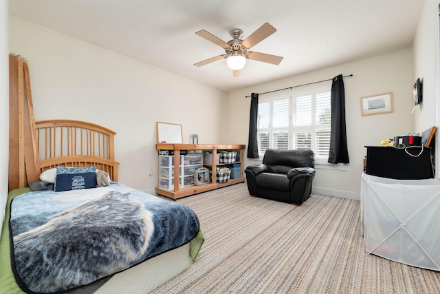 bedroom with carpet flooring and ceiling fan