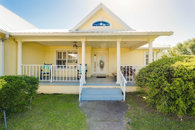 property entrance featuring a porch