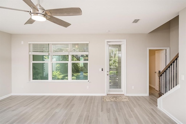 interior space featuring ceiling fan and light wood-type flooring