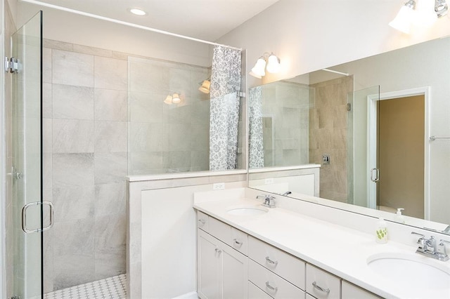 bathroom featuring vanity and a shower with shower curtain