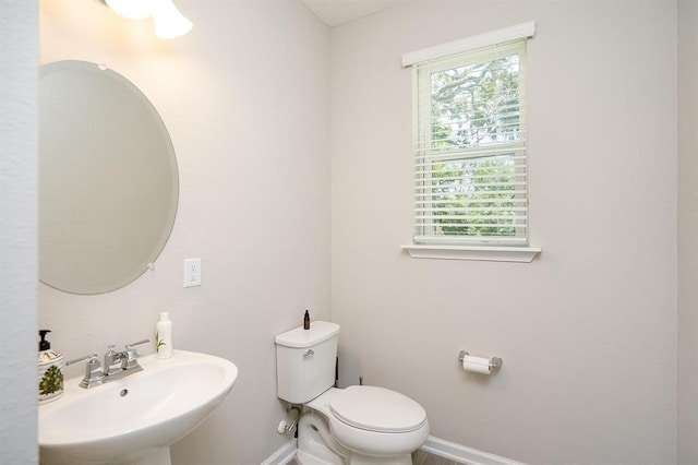 bathroom with toilet and sink