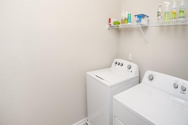 washroom featuring separate washer and dryer