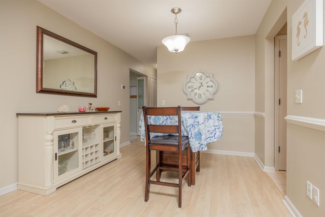 408 B St, Saint Augustine, FL 32080 - dining space with light wood finished floors and baseboards