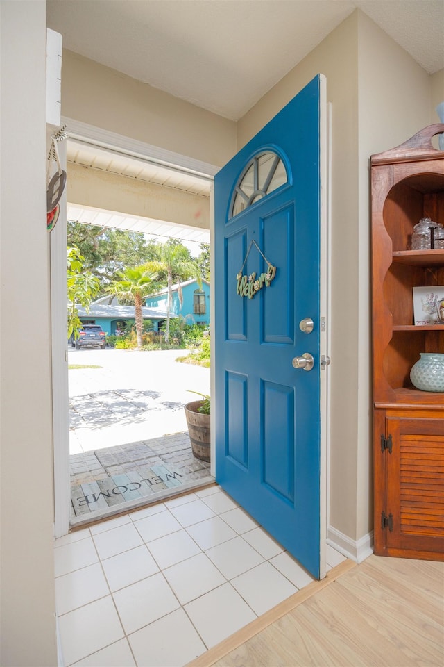 408 B St, Saint Augustine, FL 32080 - foyer with light wood-type flooring and baseboards