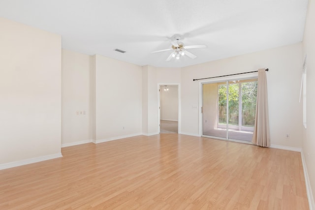 spare room featuring ceiling fan and light hardwood / wood-style flooring