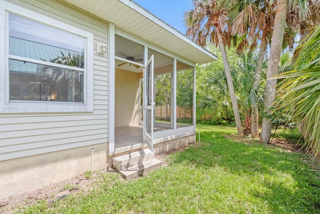 view of yard featuring a sunroom