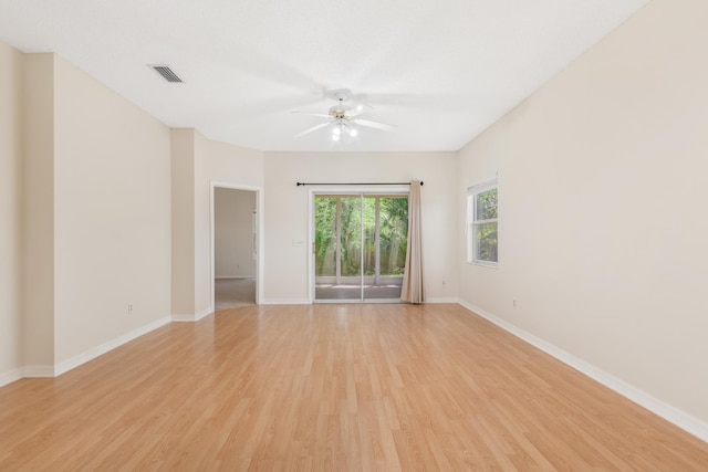 spare room with ceiling fan and light hardwood / wood-style flooring