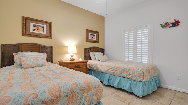 264 Gibraltar Ct Unit 101, Saint Augustine, FL 32080 - tiled bedroom with baseboards