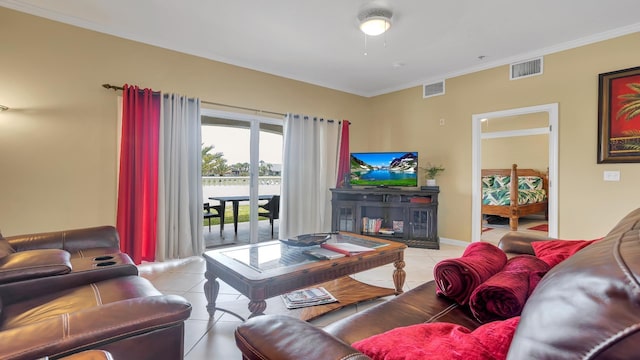 264 Gibraltar Ct Unit 101, Saint Augustine, FL 32080 - living room featuring light tile patterned floors, crown molding, and baseboards