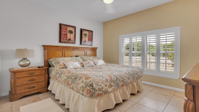 264 Gibraltar Ct Unit 101, Saint Augustine, FL 32080 - bedroom with light tile patterned flooring, baseboards, and a ceiling fan