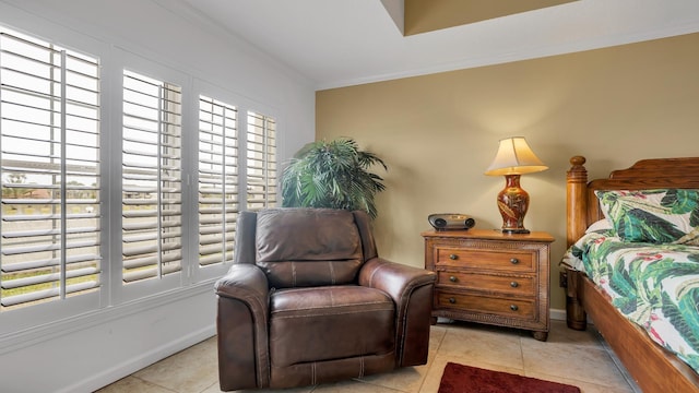 264 Gibraltar Ct Unit 101, Saint Augustine, FL 32080 - bedroom with crown molding and light tile patterned floors