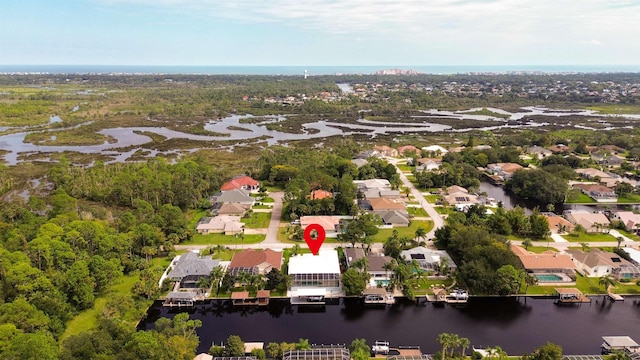 aerial view featuring a water view