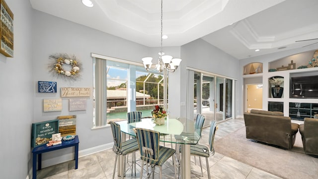 dining area with an inviting chandelier