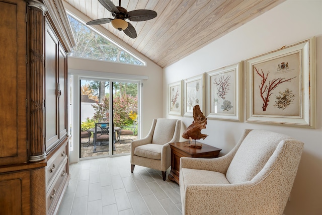 sitting room featuring wood ceiling, ceiling fan, and vaulted ceiling