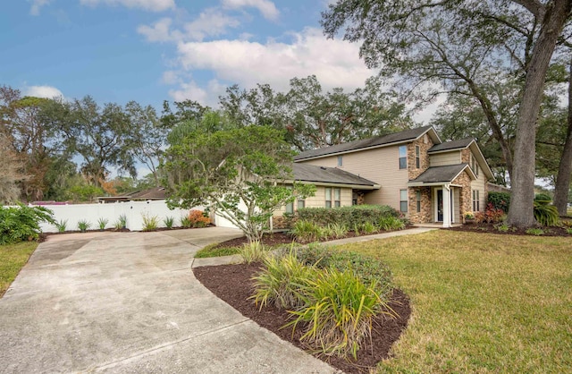 view of front of home with a front yard