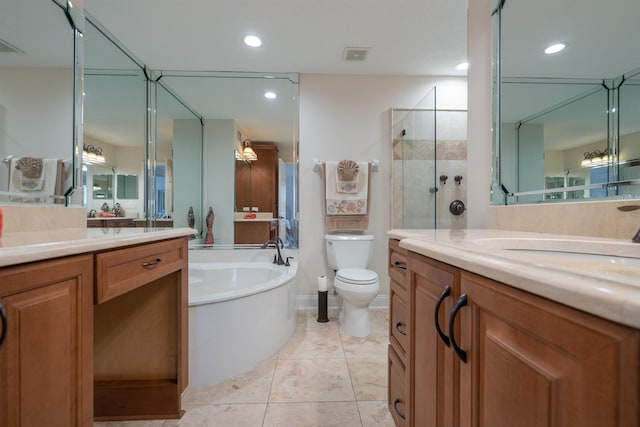 full bathroom featuring tile patterned flooring, vanity, toilet, and separate shower and tub