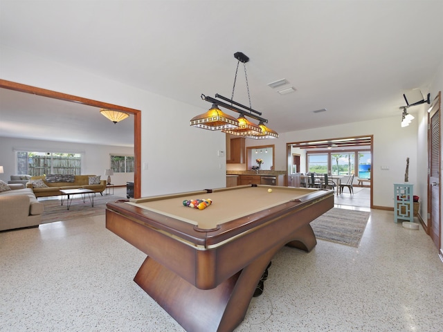 playroom with a wealth of natural light and billiards