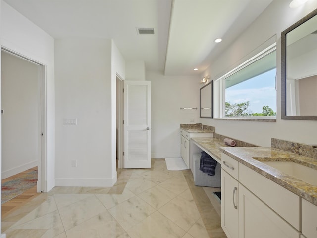 bathroom featuring vanity