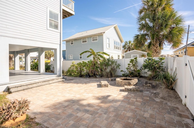 view of patio / terrace with a fire pit