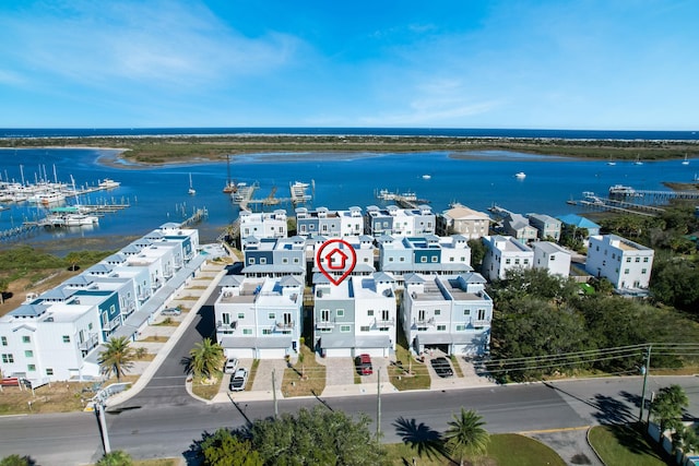 birds eye view of property featuring a water view