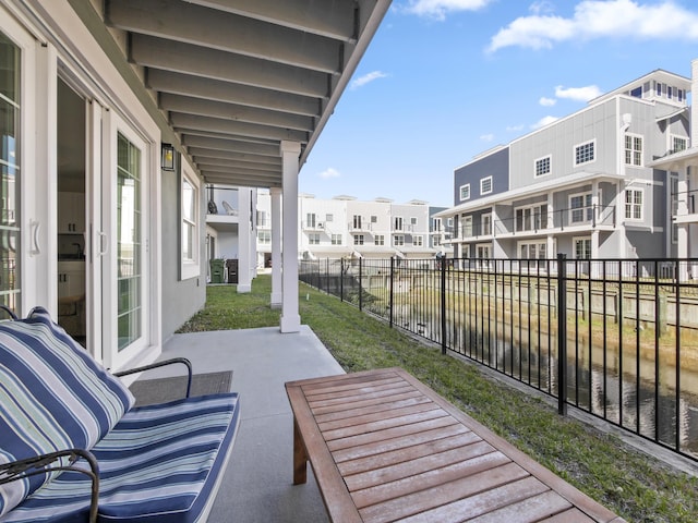 view of patio / terrace with a water view