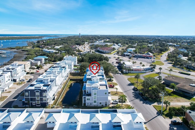 drone / aerial view with a water view