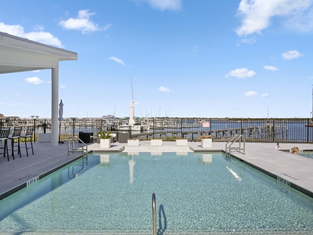 view of swimming pool featuring a patio