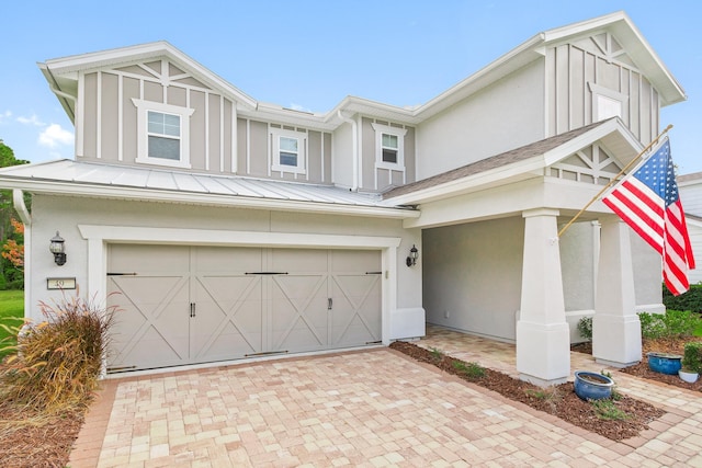 view of front of property featuring a garage