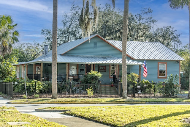 view of front facade with a porch and a front lawn