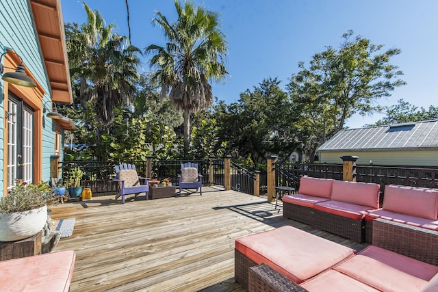 wooden deck featuring an outdoor hangout area