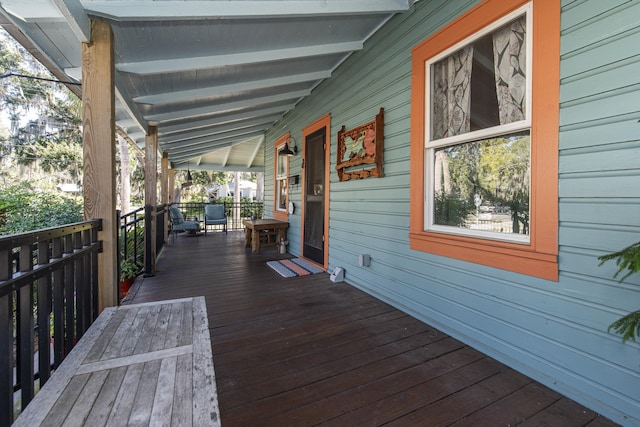 wooden deck featuring a porch